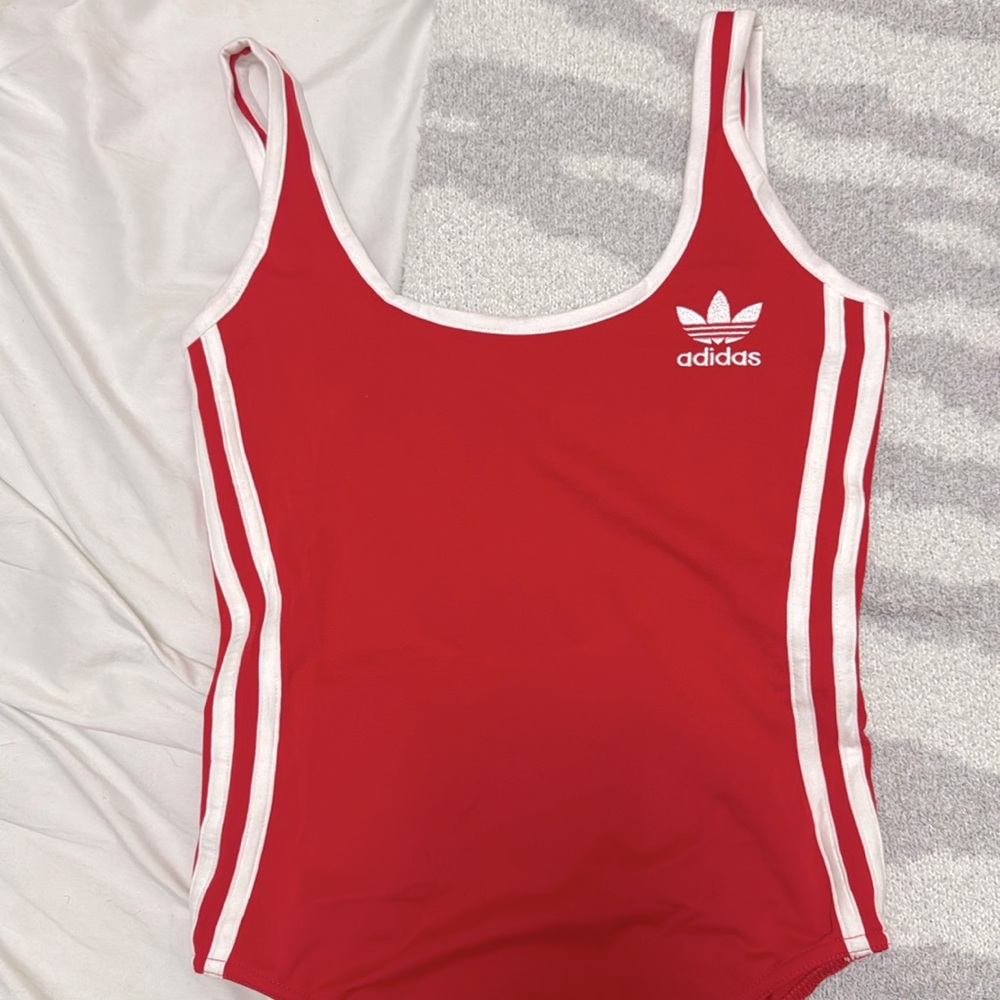Red bodysuit with open back, never worn
